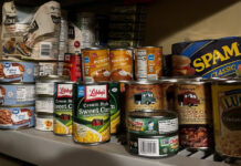 One shelf of canned goods in Pete's Prepper Pantry.