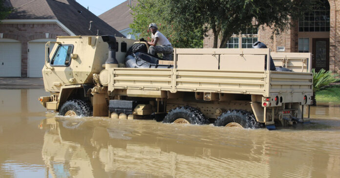 A military vehicle patrols neighborhoods around Houston looking for flood victims who need to be rescued after Hurricane Harvey struck in 2017.