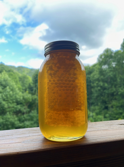 This quart of honey has two big slabs of honey comb inside. We market this as "chunk honey."