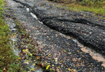 We had enough rain to significantly erode our access road.