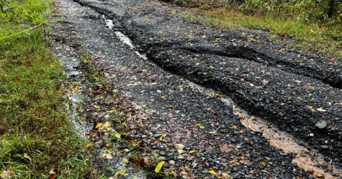 We had enough rain to significantly erode our access road.