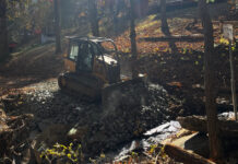 The DOT took a quick and dirty approach to repairing our ford -- just fill it in with rocks. At least we are able to get across it.