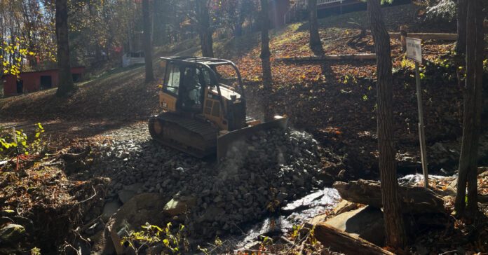 The DOT took a quick and dirty approach to repairing our ford -- just fill it in with rocks. At least we are able to get across it.