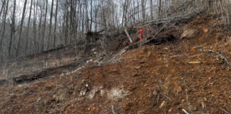 Seeing the fellow at the top of the landslide in Samaritan's Purse orange T-shirt helps put into perspective how large our landslide is.