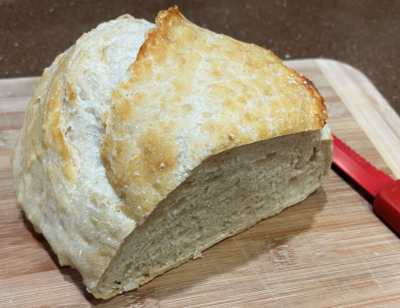 A loaf of homemade bread backed in a Dutch oven. The foundation of a good prepper meal!