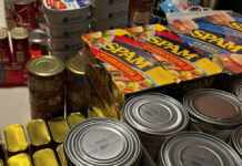 I stacked and sorted our canned foods as part of the inventory process.