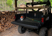 The bed on our Polaris Ranger now has a wooden rail system around it to better hold in firewood and other loads.