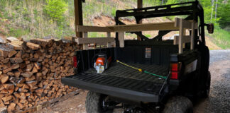 The bed on our Polaris Ranger now has a wooden rail system around it to better hold in firewood and other loads.