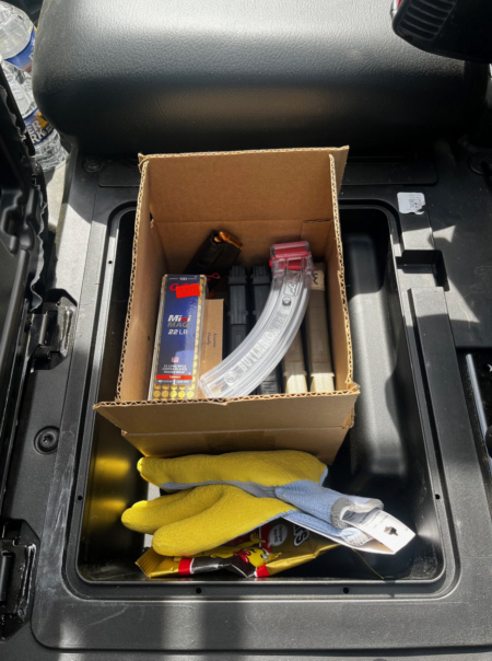 When closed, this cardboard box fits perfectly under the diver's seat of the Ranger. it includes .22LR, 9mm, 5.56 and .300 Blackout ammo and magazines.