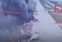 Footage from a video showing burning bombers at a Russian airbase after a Ukrainian drone attack.