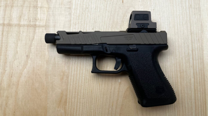 The frame 0of this pistol is from a 30-year-old Glock 23. The slide, 9mm barrel and Hol0oson 509T optic are brand new. This conversion updates an old .40 caliber gun into a modern, optic-ready 9mm.