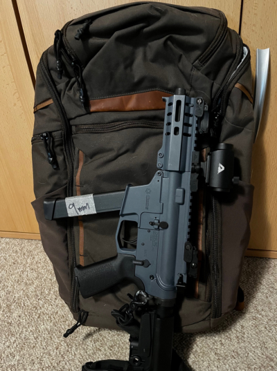 This 9mm AR0style pistol barely fits in the Gamut 26.  A folding PCC might be a better choice.