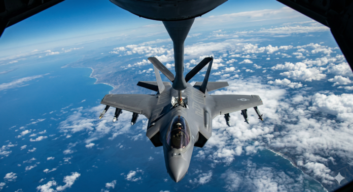 An F-35 Lighting II stealth jet refuels in mid air.