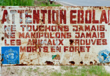 The 2026 Ebola Outbreak: Why Preppers Need to Stay Vigilant An Ebola warning sign from a prior outbreak.