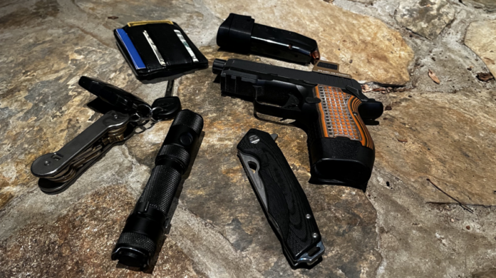 edc-7-19-26 This is my minimum EDC, minus the phone, which I used to snap the photo. This stuff goes in my pocket every day. Sometimes a revolver, tourniquet, or other gear is added.